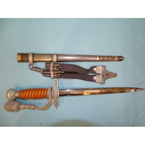 336 - Stocker & Co, a WWII German Luftwaffe 2nd pattern dress dagger with orange celluloid grip, havin... 