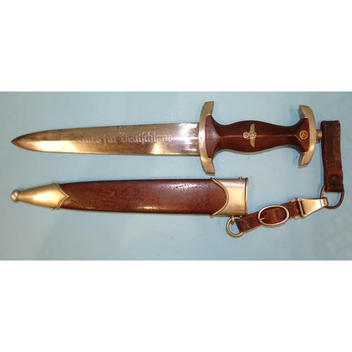 337 - A WWII German S.A. M33 dagger, the double-edged blade marked Gebr. Becker, Solingen trademark, brown... 