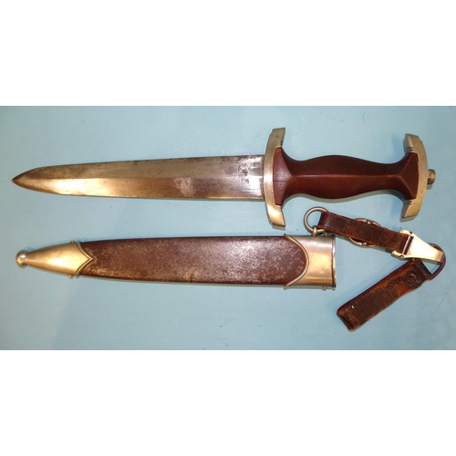 337 - A WWII German S.A. M33 dagger, the double-edged blade marked Gebr. Becker, Solingen trademark, brown... 