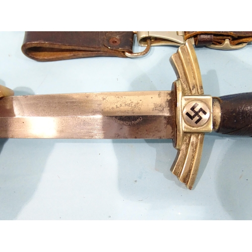 339 - A WWII German Third Reich DLV/Luftwaffe flyer's dagger with leather grip, cross guard with blackened... 