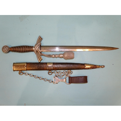 340 - A WWII German Luftwaffe 1st model officer's dress dagger with leather and wire-bound grip, the pomme... 