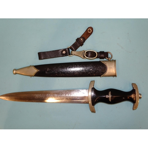 347 - A WWII German Third Reich personalised S.A. marine dagger with black finish to grip, eagle, swastika... 