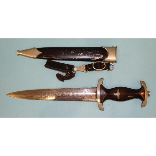 349 - A WWII German Third Reich SA marine dagger with brown wooden grip with metal eagle, swastika and ena... 