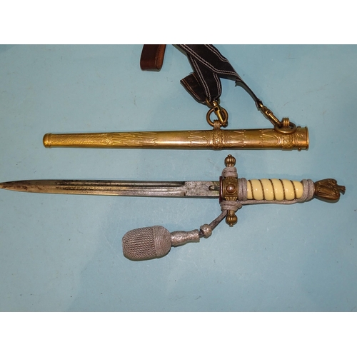 356 - A WWII German Kriegsmarine officer's dress sword by E & F Horster, Solingen, with white celluloi... 