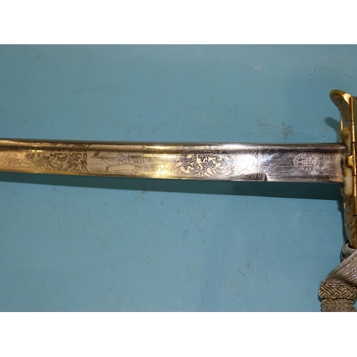 356 - A WWII German Kriegsmarine officer's dress sword by E & F Horster, Solingen, with white celluloi... 