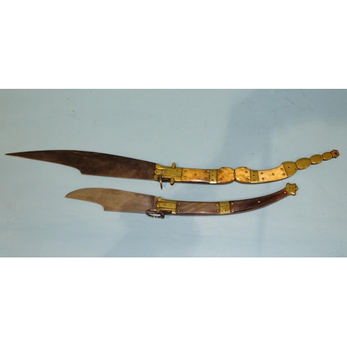 361 - A large Navaja knife with shaped folding blade and horn or bone handle, the blade marked NAVAJAS DE ... 