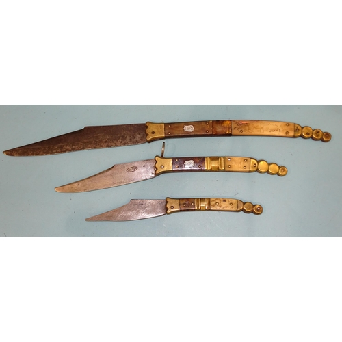 362 - Two small Navaja knives, each with horn and tortoiseshell grips, one stamped TOLEDO, both well-sprun... 