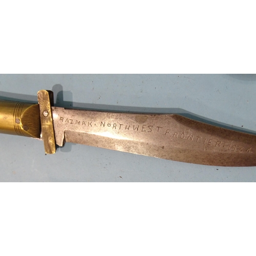 366 - An Indo-Persian brass and bone-inlaid folding knife with folding blade guard, the blade inscribed 