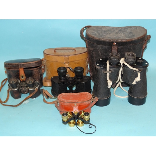 372 - A pair of Anchor Optical Corp 7x50 military binoculars, two pairs of 6x binoculars by C P Goerz and ... 