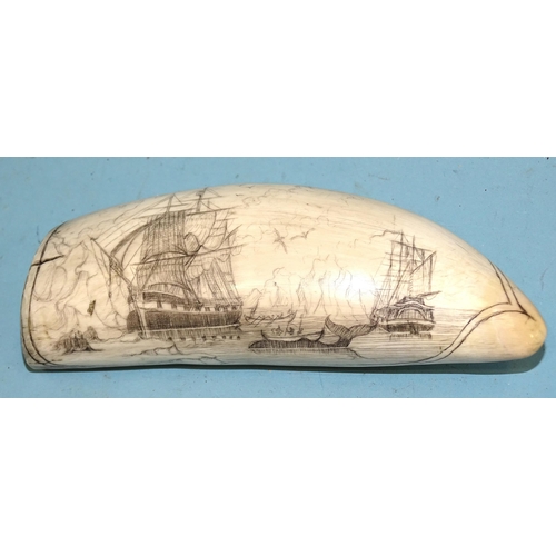 374 - A 19th century Arctic whaling scrimshaw tooth depicting a whaling scene of two ships, two boats with... 