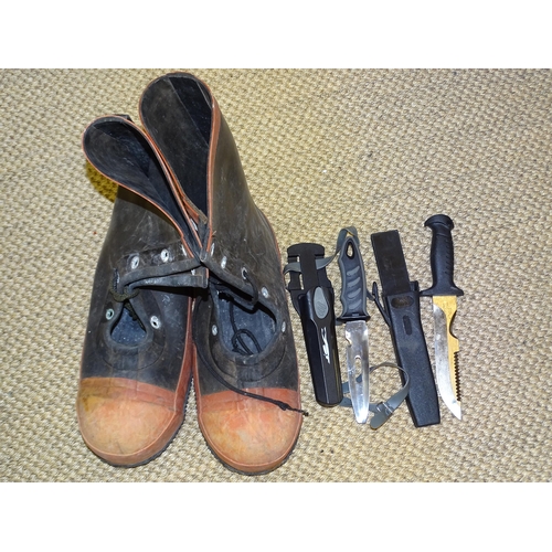 387 - A pair of enormous rubber over-boots, 38cm long and two modern diver's knives, (3).