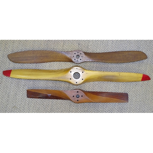 388 - Three wooden propellers, 111cm, 106cm and 79cm, (3).