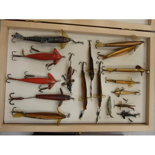 406 - A collection of approximately 70 lures, baits and minnows, including examples by Hardy, Farlows, Hat... 