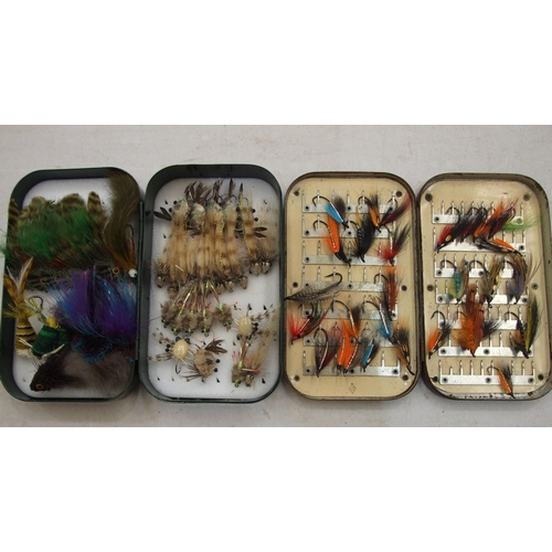 409 - A collection of 28 salmon flies in a metal fly tin and approximately 38 lures/flies in a Bakelite bo... 