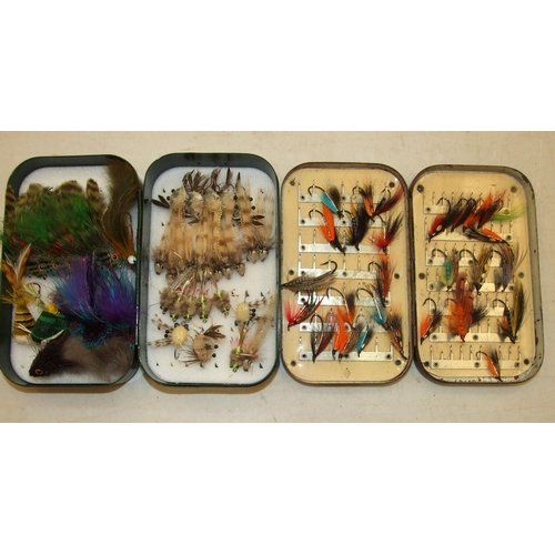 409 - A collection of 28 salmon flies in a metal fly tin and approximately 38 lures/flies in a Bakelite bo... 