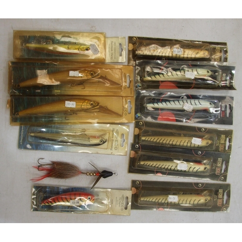 410 - A collection of twelve large artificial salmon baits and a quantity of soft baits and miscellaneous ... 