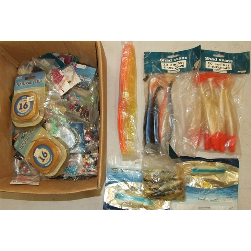 410 - A collection of twelve large artificial salmon baits and a quantity of soft baits and miscellaneous ... 