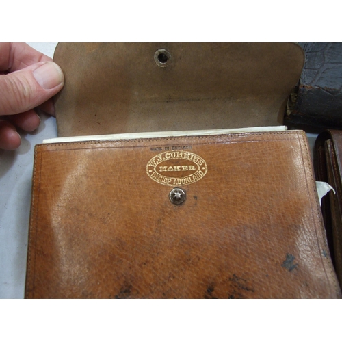 413 - Six leather fly wallets by W J Cummins, C Farlow & Co. Ltd, Army and Navy CSL and others.... 