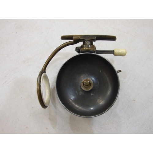 418 - A Mallocks Patent side-caster reel of alloy with bronze foot, ratchet knob and arm with ceramic line... 