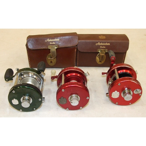 429 - An Abu Ambassadeur 5000 multiplier reel, a 5000B multiplier reel, both in leather cases and a 5000CS... 