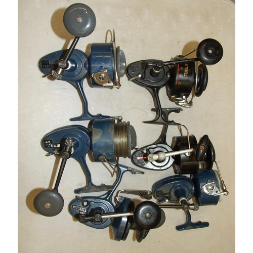 438 - A collection of six Mitchell sea fishing spinning reels, including 486 (x3), 387, 499, (one unnumber... 