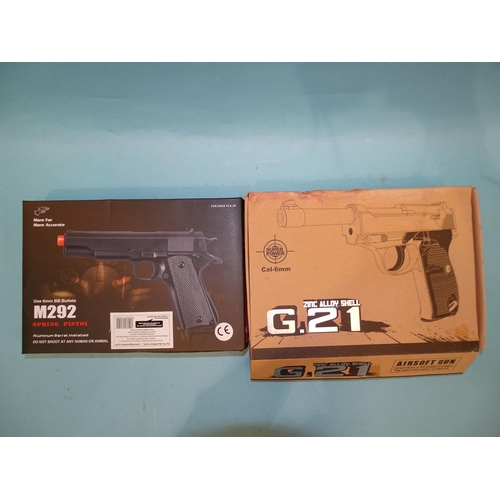 445 - Two boxed cal 6mm BB guns: G21 and M292 spring pistol, (2).