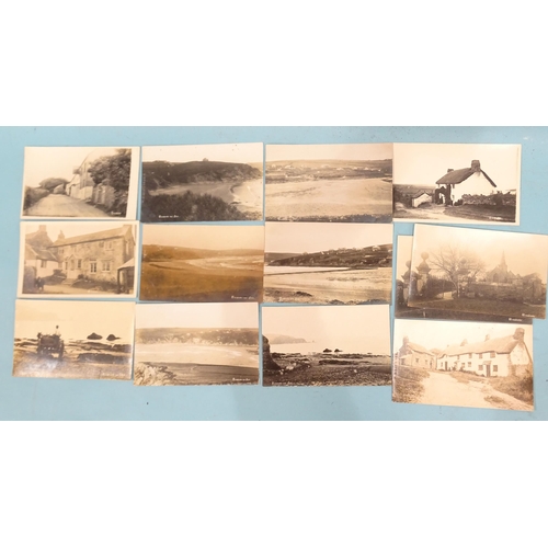 66 - Twenty-six W R Gay RP postcards of Bigbury-on-Sea, including horse and cart on the beach, church cot... 