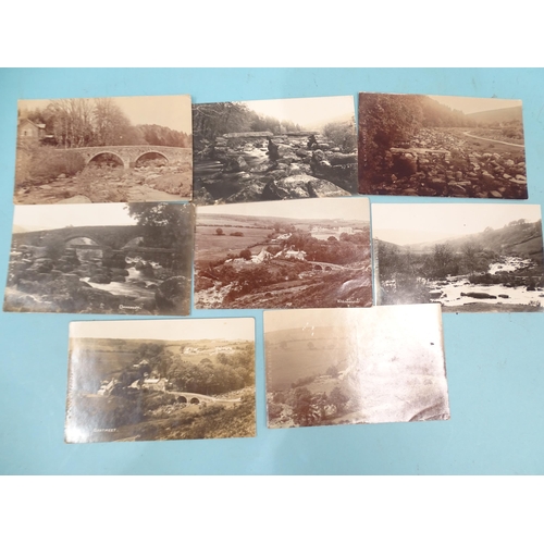 74 - Sixteen W R Gay RP postcards of Dartmeet, many of the road bridge and clapper bridge.... 