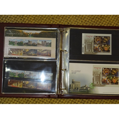 157 - A collection of Great British presentation packs, mint sets and first day covers, in thirty-one albu... 