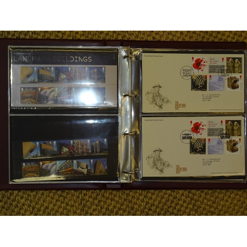 157 - A collection of Great British presentation packs, mint sets and first day covers, in thirty-one albu... 