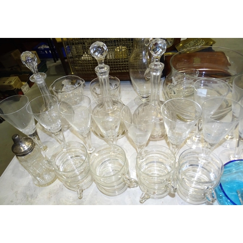 33 - A pair of Victorian glass decanters, ten Champagne flutes and other glassware.