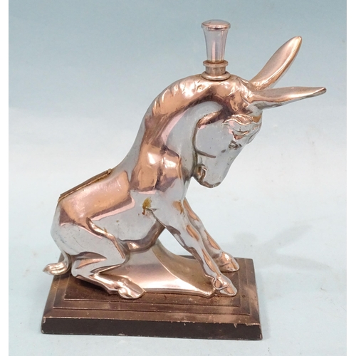 73 - A chromium-plated table lighter in the form of a donkey, 14cm high, an Art Deco-style Ronson chrome-... 