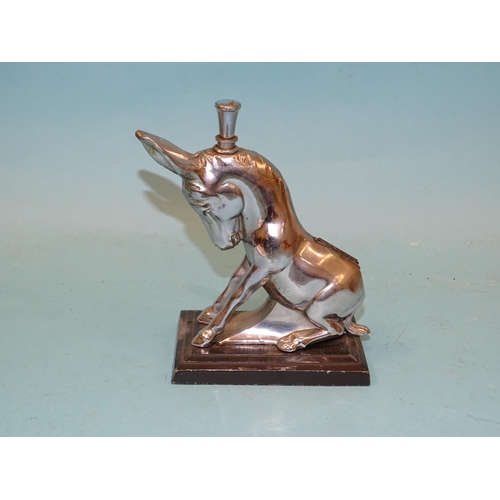 73 - A chromium-plated table lighter in the form of a donkey, 14cm high, an Art Deco-style Ronson chrome-... 