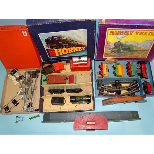 77 - Hornby O gauge, a c/w M.O. Mixed Goods Set, (boxed), a goods part-set, two boxed wagons, a wooden pl... 