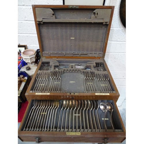 93 - A part-canteen of plated cutlery, in fitted wood box.