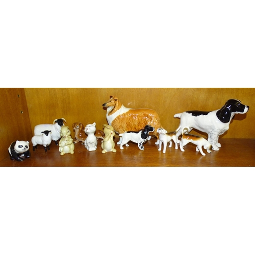 101 - A collection of eleven Beswick animal sculptures, including Cocker Spaniel 