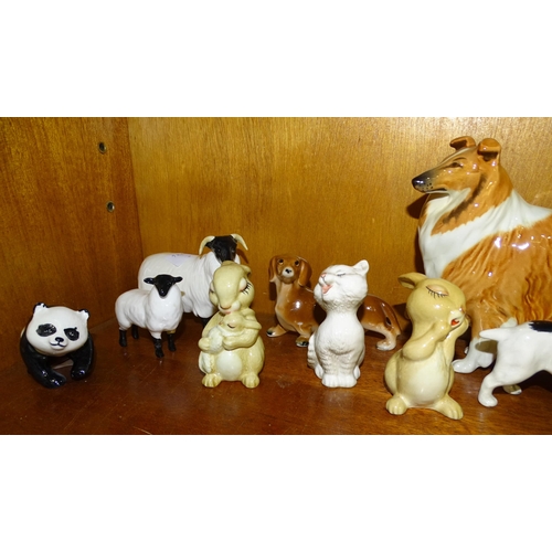 101 - A collection of eleven Beswick animal sculptures, including Cocker Spaniel 