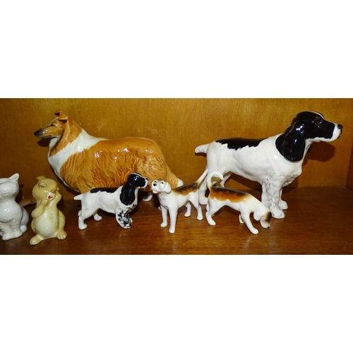 101 - A collection of eleven Beswick animal sculptures, including Cocker Spaniel 