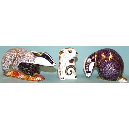 109 - Three Royal Crown Derby ceramic paperweights: Woodland Badger (gold button, boxed), Mouse (gold butt... 