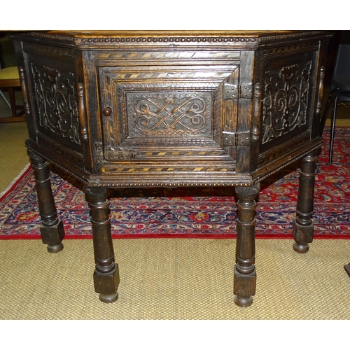 2 - A reproduction carved wood sideboard of trapezoid shape and raised on four turned legs, 92cm high, 1... 