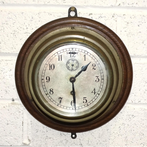 25 - A collection of eight brass-framed ships clocks, all in need of repair, (8).