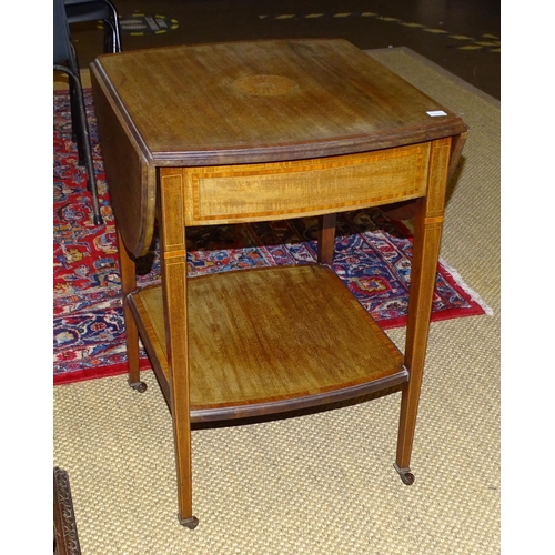 5 - An early-20th century mahogany drop-leaf table with central inlaid motif, single drawer and lower ti... 