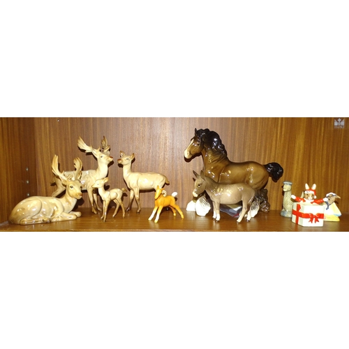 60 - A Beswick deer family, comprising Stag-Standing (part of antler re-glued), Stag-Lying (one antler re... 