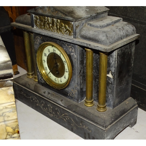 63 - A late-19th century slate and marble mantel clock in the Egyptian style, of tapering form, the movem... 