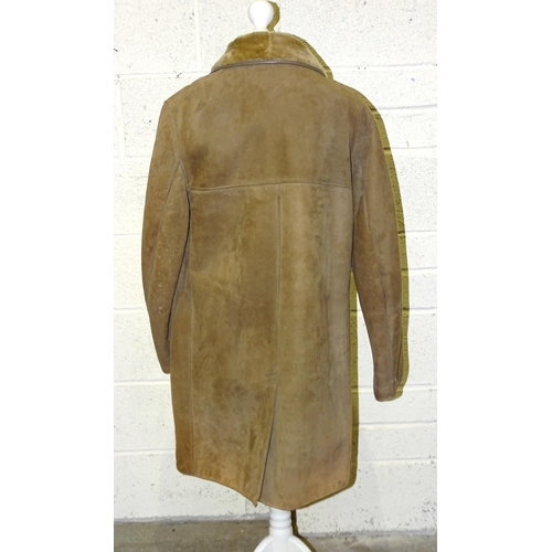 84 - A lady's long brown suede double-breasted coat, belted, with honey-coloured fur collar and lapels, s... 