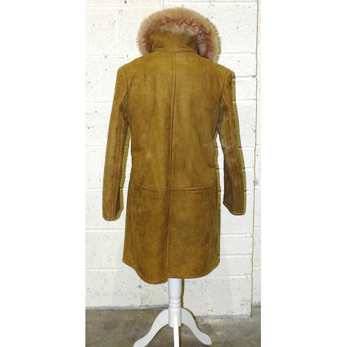 84 - A lady's long brown suede double-breasted coat, belted, with honey-coloured fur collar and lapels, s... 