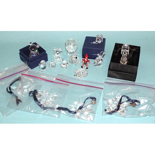 141 - A small collection of Swarovski miniature glass animal figures, including a teddy bear (x3), squirre... 