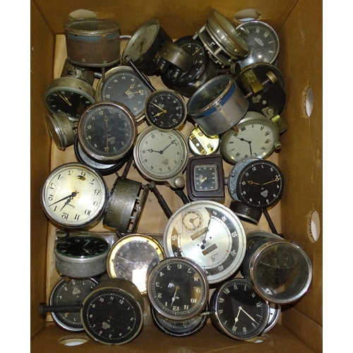 69 - A collection of approximately thirty various car clocks, mainly Smiths, (in poor condition).... 