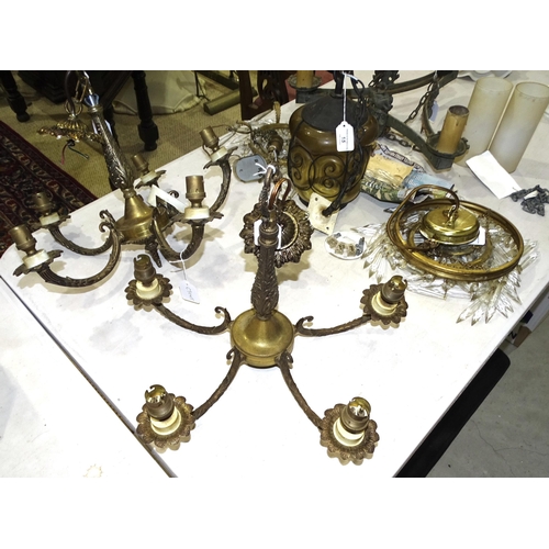 15 - Three various gilt metal hanging light fittings, a glass and metal hanging lantern and two hanging l... 