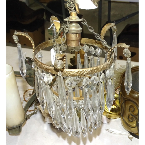 15 - Three various gilt metal hanging light fittings, a glass and metal hanging lantern and two hanging l... 